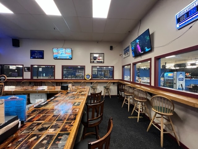 Sports bar interior with wooden counters at Newport Entertainment Center